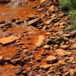 Rocks stained by acid mine drainage on Shamokin…
